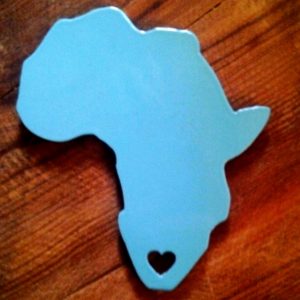 Africa magnet on wooden table