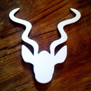 Kudu magnet on wooden table