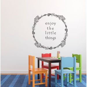 wreath and text on wall